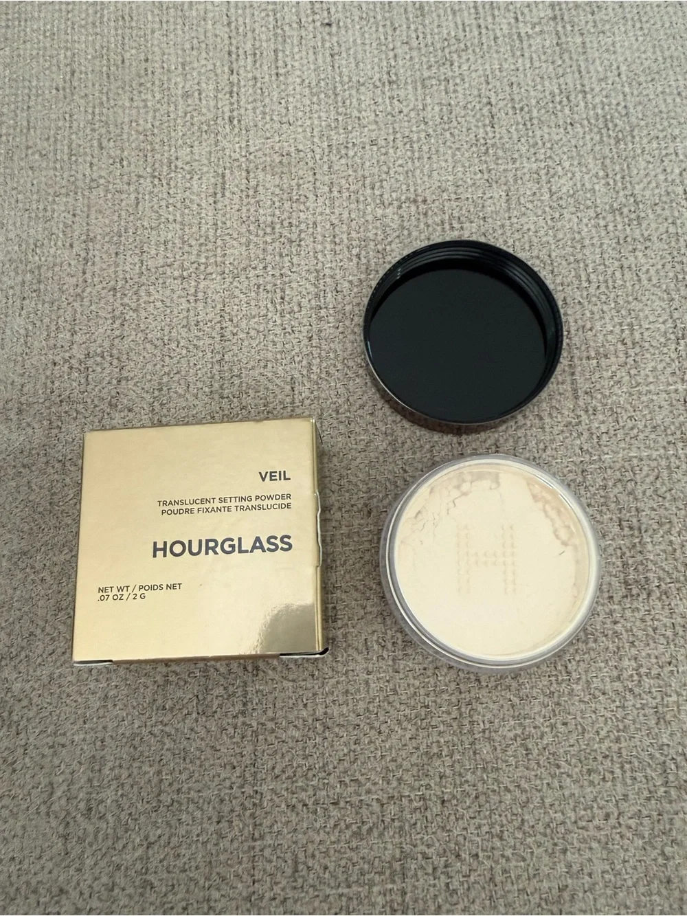 Mini Hourglass Veil Translucent Setting Powder in a 2g travel size container.